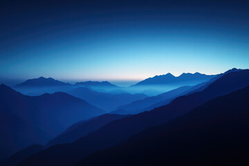 Obraz premium Serene twilight descends upon a majestic mountain range, casting long shadows and a tranquil blue hue.