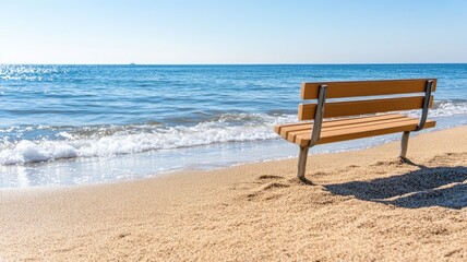 Fototapeta premium Wooden bench by sea on sandy beach