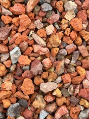 Closeup of landscaping lava rocks for a flower bed