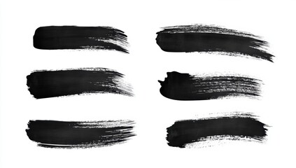 Collection of black brush strokes on a white background for artistic and design elements