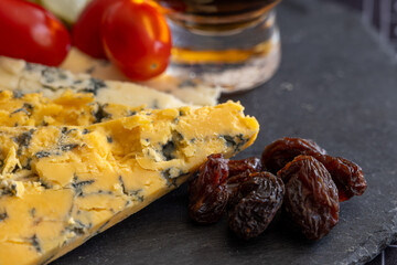 Cheese collection, English cow milk semi-soft, crumbly old blue stilton and blue shropshire cheeses