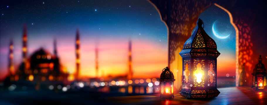 Ramadan Kareem - Arabic Lantern With Crescent Moon - Defocused Mosque On Background At Sunset With Bokeh Lights