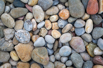 Colourful pebbles on the Gower peninsula, Swansea, UK.
