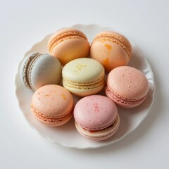 Obraz premium Assorted Pastel Macarons on White Plate Delicious French Pastry Sweet Treat