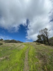 green mountain blue sky hike