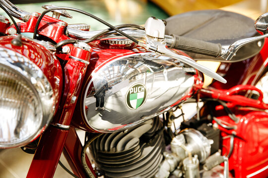 Red puch motorcycle with chrome details and vintage design, oldtimer