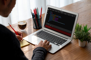 Software development programming on computer screen for modish application and program coding