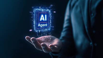 A human businessperson interacting with an AI agent hologram using their hands symbolizing agentic autonomy and the automation of work using teamwork with a chatbot assistant