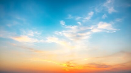 Obraz premium Serene Sunset Sky With Soft Clouds and Warm Hues