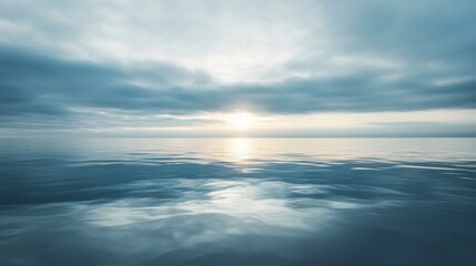 Obraz premium Calm sunrise over tranquil water, possible use for a peaceful nature scene