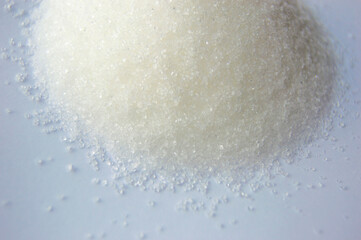 white sugar on a blue background
