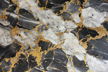 Obraz premium A striking black and white marble surface is prominently featured, enhanced with intricate golden veins that add a touch of luxury, perfect for upscale interior decor.