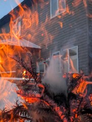  fire against the background of houses.