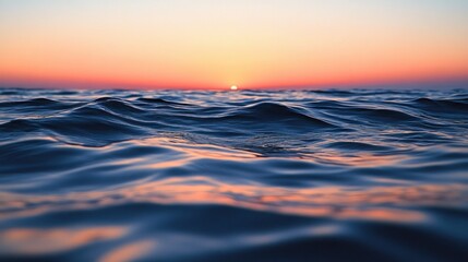 Fototapeta premium Serene sunset over calm ocean waves at twilight