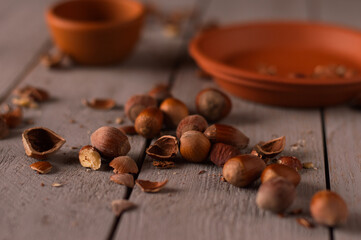Hazelnuts and shells on the table