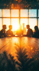 Silhouetted figures in a meeting, bathed in the warm glow of a setting sun.