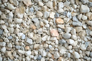 A textural symphony of nature's pebbles, Exploring a harmonious arrangement of rocks and stones in a captivating ground surface display