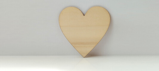 Crafting love wooden heart decoration home studio diy project minimalist setting top-down...