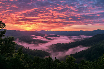 Fototapeta premium Stunning sunrise over misty mountains with a colorful sky