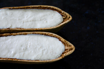 Traditional cupuaçu cream, cupuaçu mousse served in the fruit shell with grated chocolate