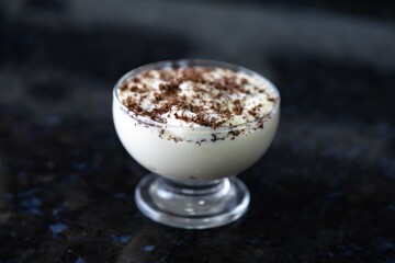 Traditional cupuaçu cream, cupuaçu mousse served in the fruit shell with grated chocolate