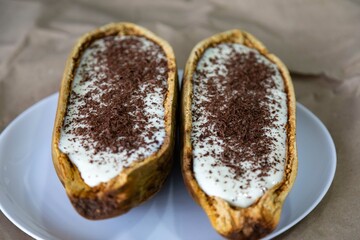 Traditional cupuaçu cream, cupuaçu mousse served in the fruit shell with grated chocolate