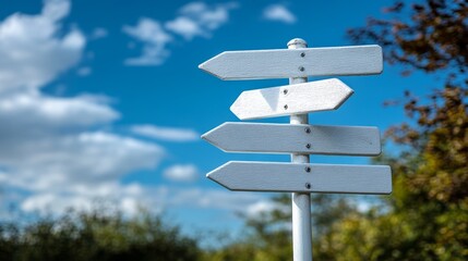 Signpost directing travelers on a sunny day in a tranquil outdoor setting surrounded by trees