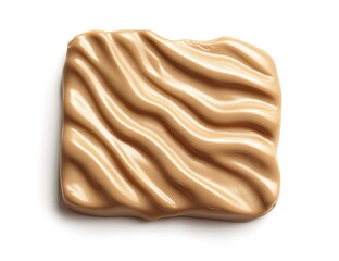 Creamy, light brown textured square.  Swirled pattern on a smooth surface.