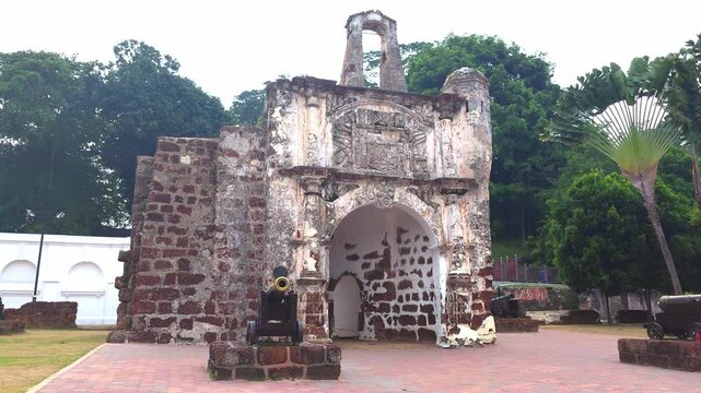A Famosa ruins in Malacca, Malaysia, featuring colonial stone walls and remnants of the old fort, establishing dolly