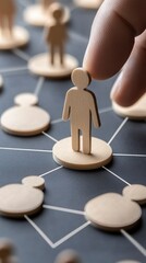 Obraz premium Wooden Figure Network: Hand Connecting People