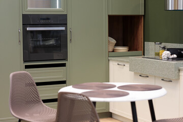 domestic kitchen with dining table and chairs