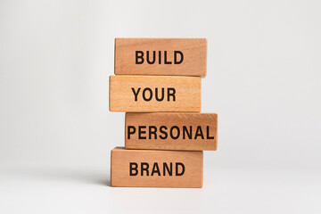 build you personal brand words text on wooden blocks on white background. personal branding concept symbol. copy space
