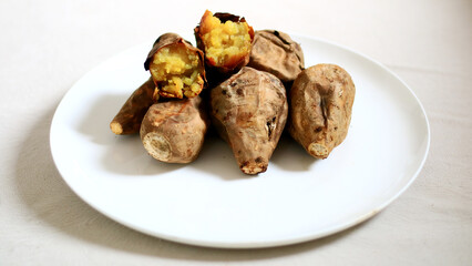 Grilled Cilembu honey sweet potato. Ubi Cilembu is a specialty sweet potato native to the Cilembu village and nearby areas in West Java, Indonesia.