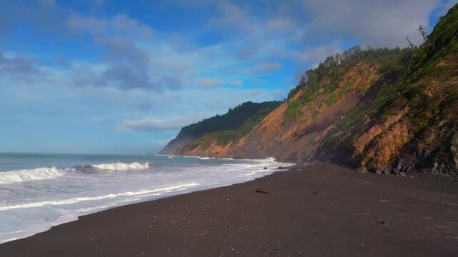 Sunny morning USAL Beach campground PNW Lost Coast Trail aerial drone California rugged dramatic untouched coastline mist fog clouds surf waves crashing on shore nature landscape static shot