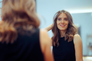 Woman Admiring her New Looks in a Hair Salon. Confident lady feeling positive and trendy after hair...
