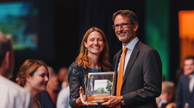 A corporate sustainability award being presented to a company for outstanding environmental efforts.