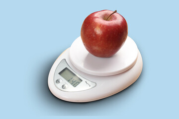 apple on digital scale kilogram