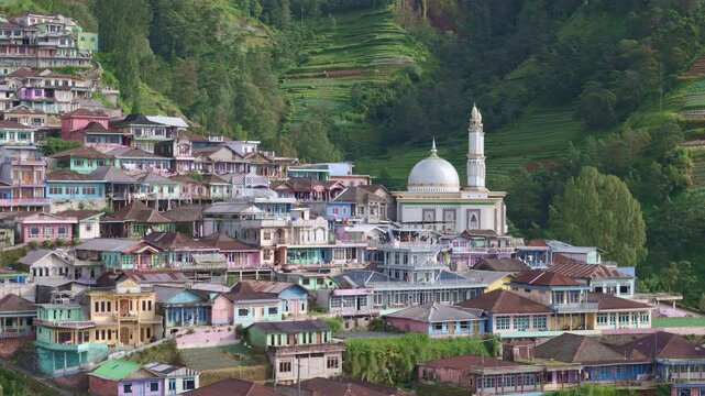 Beautiful scenery of Nepal Van Java village. Colorful houses on the slopes of Mount Sumbing, Indonesia. 4K drone video.