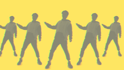 Dancing silhouette. Freestyle culture. Blur faded mirrored double exposure outline of man performing funky movements isolated on yellow background.