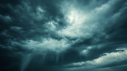 Obraz premium Dramatic Storm Clouds with Rain and Sunlight Breaking Through the Sky