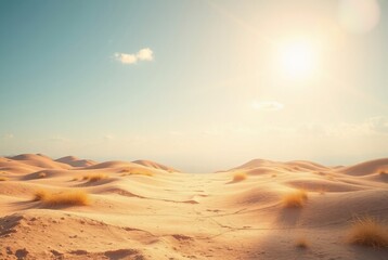 Naklejka premium Serene Desert Landscape at Sunrise with Gentle Sand Dunes and Soft Sunlight