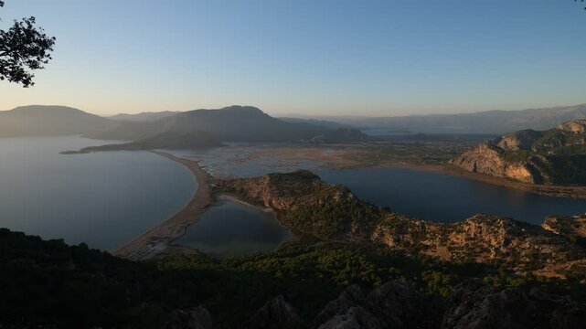 Sunset view from the top of Iztuzu beach. Ortaca district, Mugla province, Turkey country - 4K video 