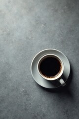Aromatic Dark Coffee in a Simple White Mug on a Textured Surface