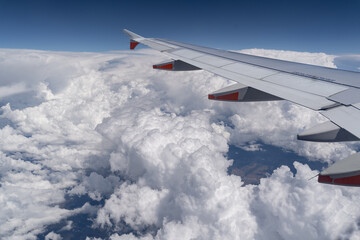 Obraz premium view of the clouds from an airplane window