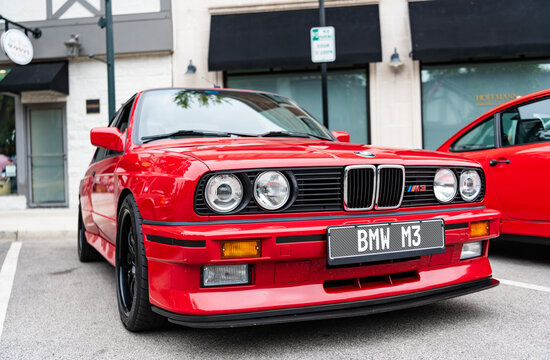 Chicago, Illinois - September 29, 2024: BMW e30 M3 parked on the street. BMW e30 M6 red color front view . BMW e30 M3 in chicago