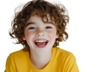 Smiling curly-haired child in a yellow shirt, isolated on transparent background