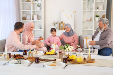 Table with traditional food set for Muslim family at home. Ramadan celebration