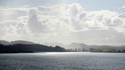 Tahiti misty coastline silhouette with moody lighting  