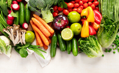 Assortment of fresh organic vegetables in rainbow colors.