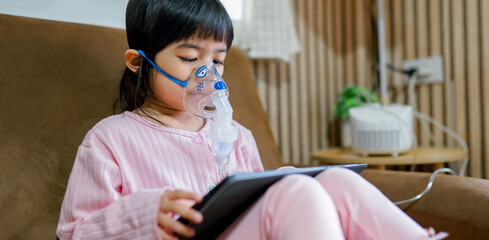 Girl using Oxygen breathing machine at home smile and surprice. Breathing device for asthma and coronavirus. Woman have problem with lungs	
